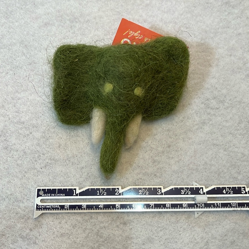 Handcrafted decorative pin. Felted Green Elephant